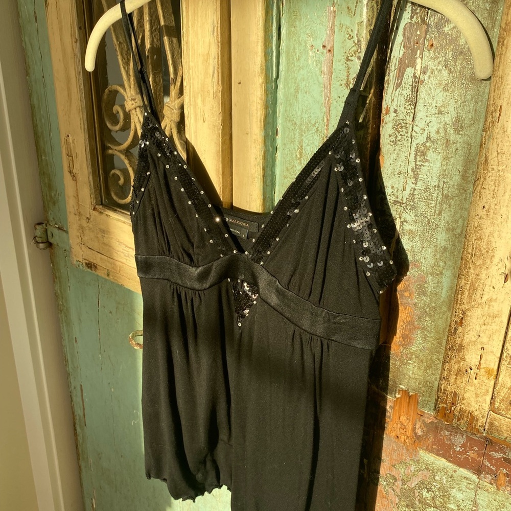 Black top camisole style. Pretty trim